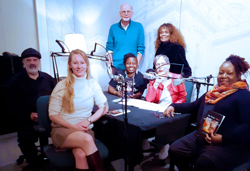 Picture of The Write Blend Poets on-air, L to R: Clifford Bernier, Liz Reitzig, Diane Wilbon Parks, (Grace Cavalieri,) Miss <ETH>Kiane� Thomas. Standing: Dr. Hiram Larew and Billye O?Kera.
